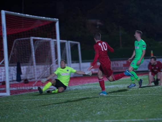 Harvey Sparks gives Worthing the lead against Dorking Wanderers on Tuesday. Picture by Marcus Hoare