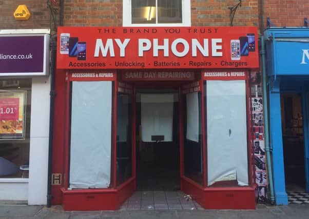 The new phone shop opening in East Street
