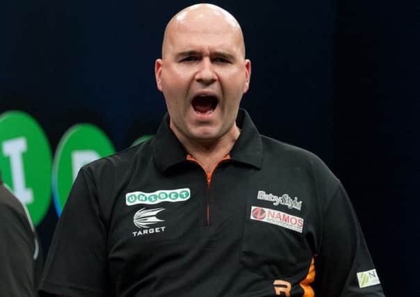 Rob Cross, pictured here at last month's Unibet European Championship, came so close to beating Michael van Gerwen last night. Picture courtesy Kelly Deckers