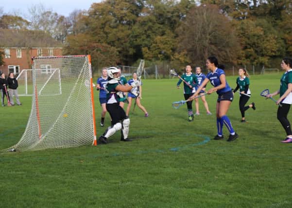 Lacrosse action at the University of Chichester / Picture by John Geeson