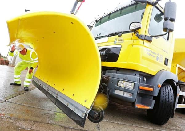 Staff checking a gritter during Operation Snowflake preparations