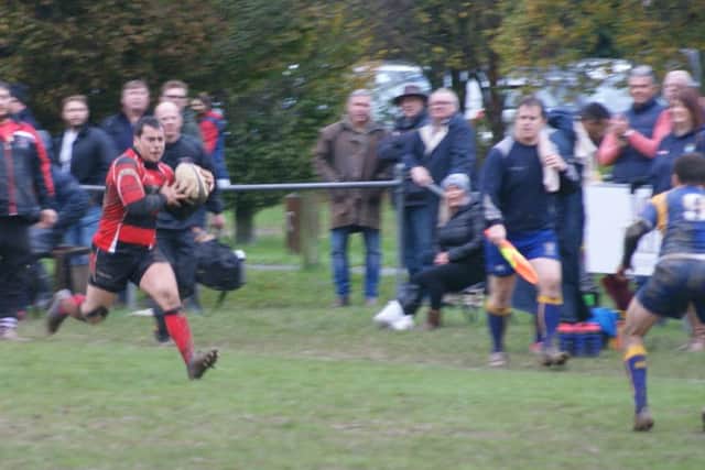 Alex Wolfe storming down the touchline during Heath's win over Beckenham