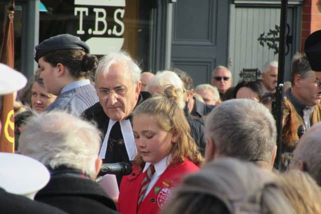 Annie Kingshott, 10, from Arundel Church of England Primary School, read her poem at the Arundel remembrance service on Sunday
