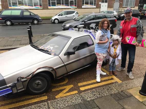 Jessica barber , William Barber and their son William Barber Junior, 5, dressed as Doc Brown. Picture: Jessica Barber