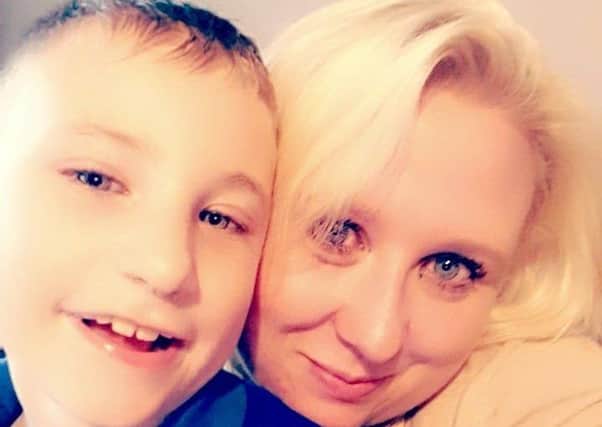 Amy Standen with her son Rhys Fuller, eight