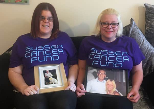 Laura Ridley and Ellen Burgess with pictures of their parents