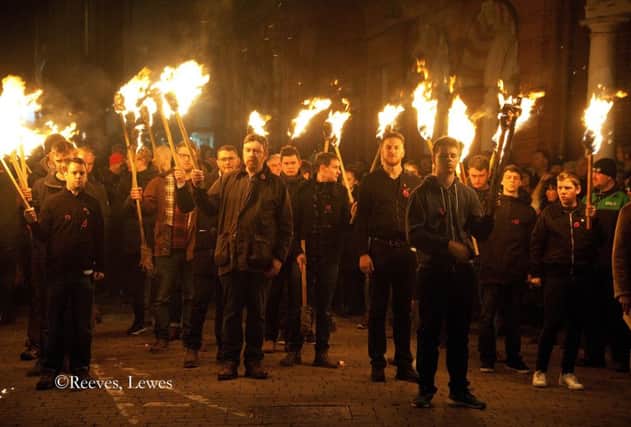Torchbearers gathered at Lewes War Memorial. Photograph by Tom Reeves