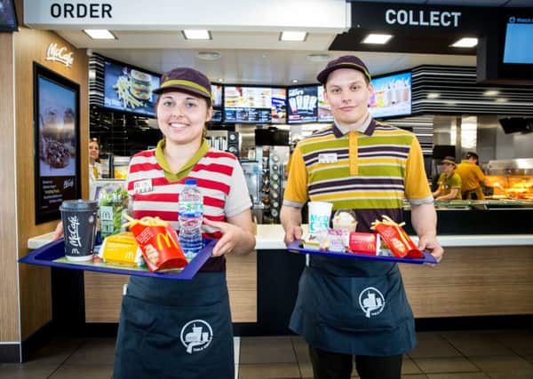 McDonald's says families benefit from the table service at some of its stores