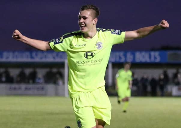 Calum Davies celebrates after completing his hat-trick against Ashford United on Saturday. Picture courtesy Scott White