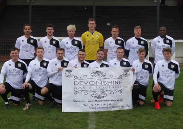 Bexhill United Football Club's first team squad in its new home kit sponsored by The Devonshire Bar & Lounge