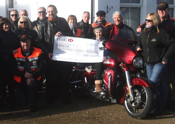 Members of The 1066 Chapter Harley Davidson owners group presented Barby Keel with a donation of ?500. SUS-171122-092612001