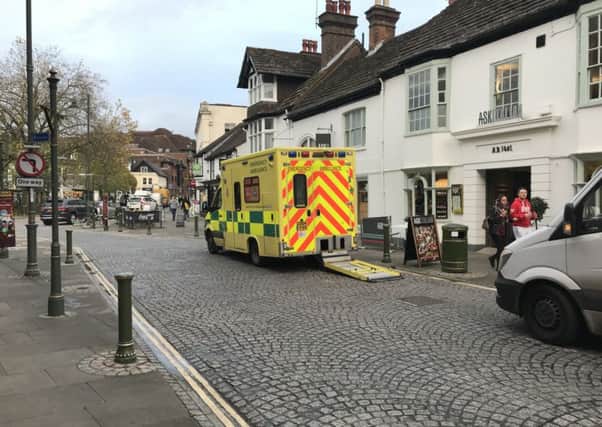 Paramedics arrived in Horsham town centre four-and-a-half-hours after being called.