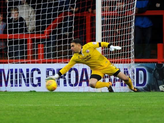 Crawley Town goalkeeper Glenn Morris skippered the side in the absence of skipper Jimmy Smith at Wycombe this afternoon. Picture by Steve Robards