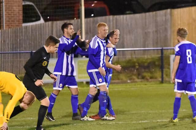 Karly Akehurst has scored the third goal. Haywards Heath Town v Selsey. Picture by Graham Lehkyj